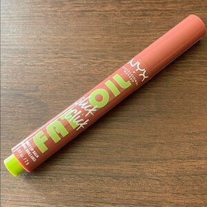 NYX Slick Click Fat Oil Shiny Tinted Lip Balm in Going Viral | Peachy Pink Nude